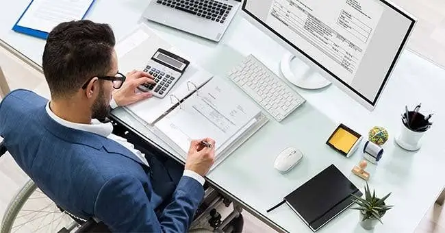 Management accounts assistant reviewing monthly financial reports in Edinburgh