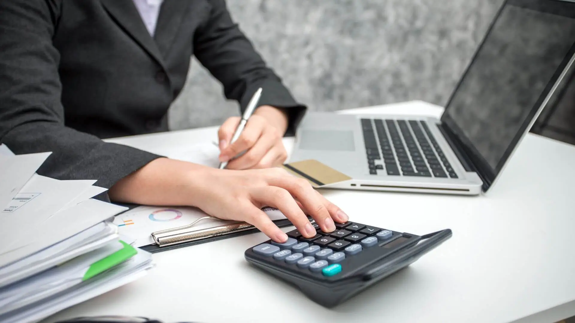Management accounts assistant reviewing monthly financial reports in Edinburgh