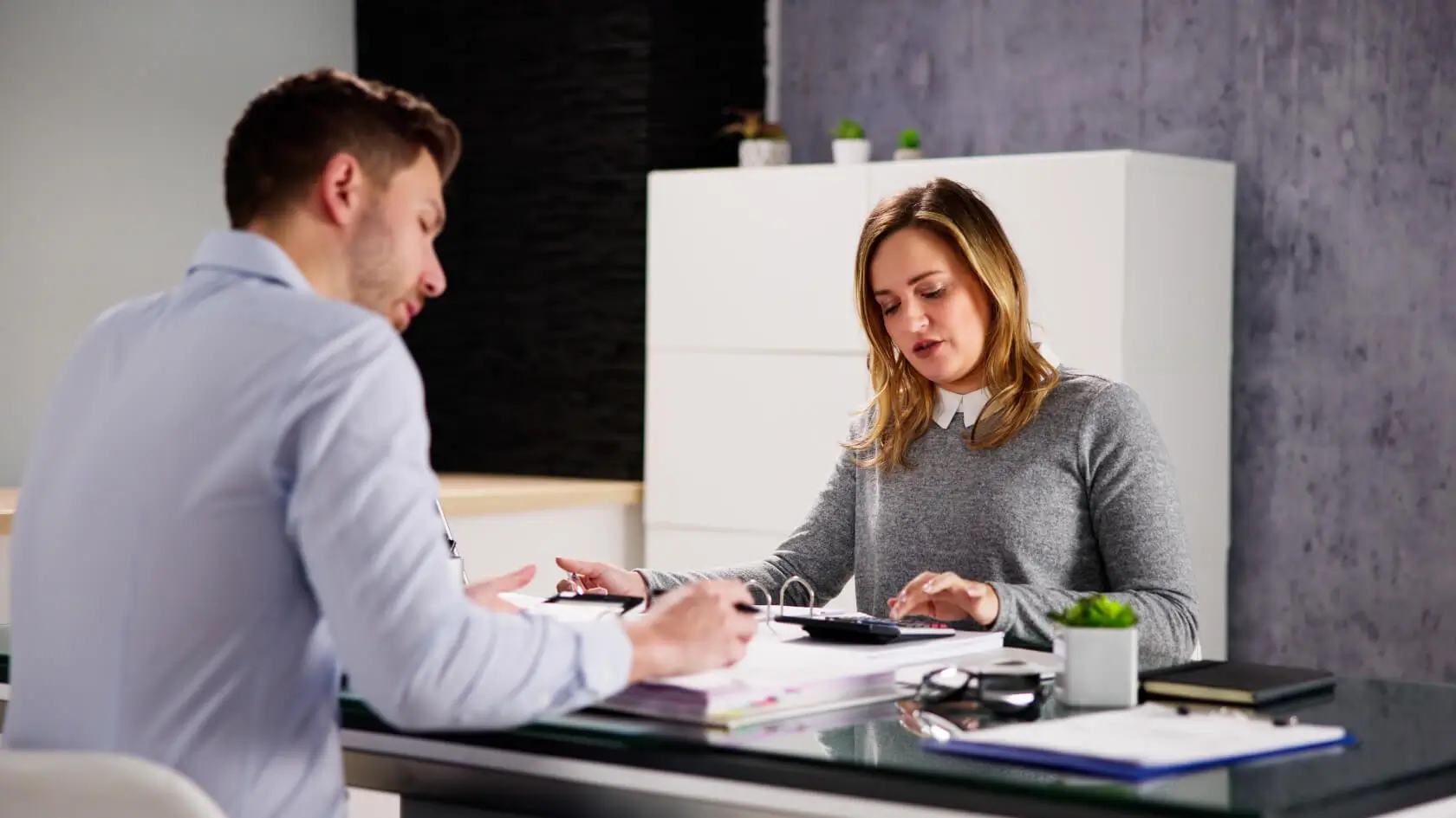 Business paperwork and compliance documents in Edinburgh office