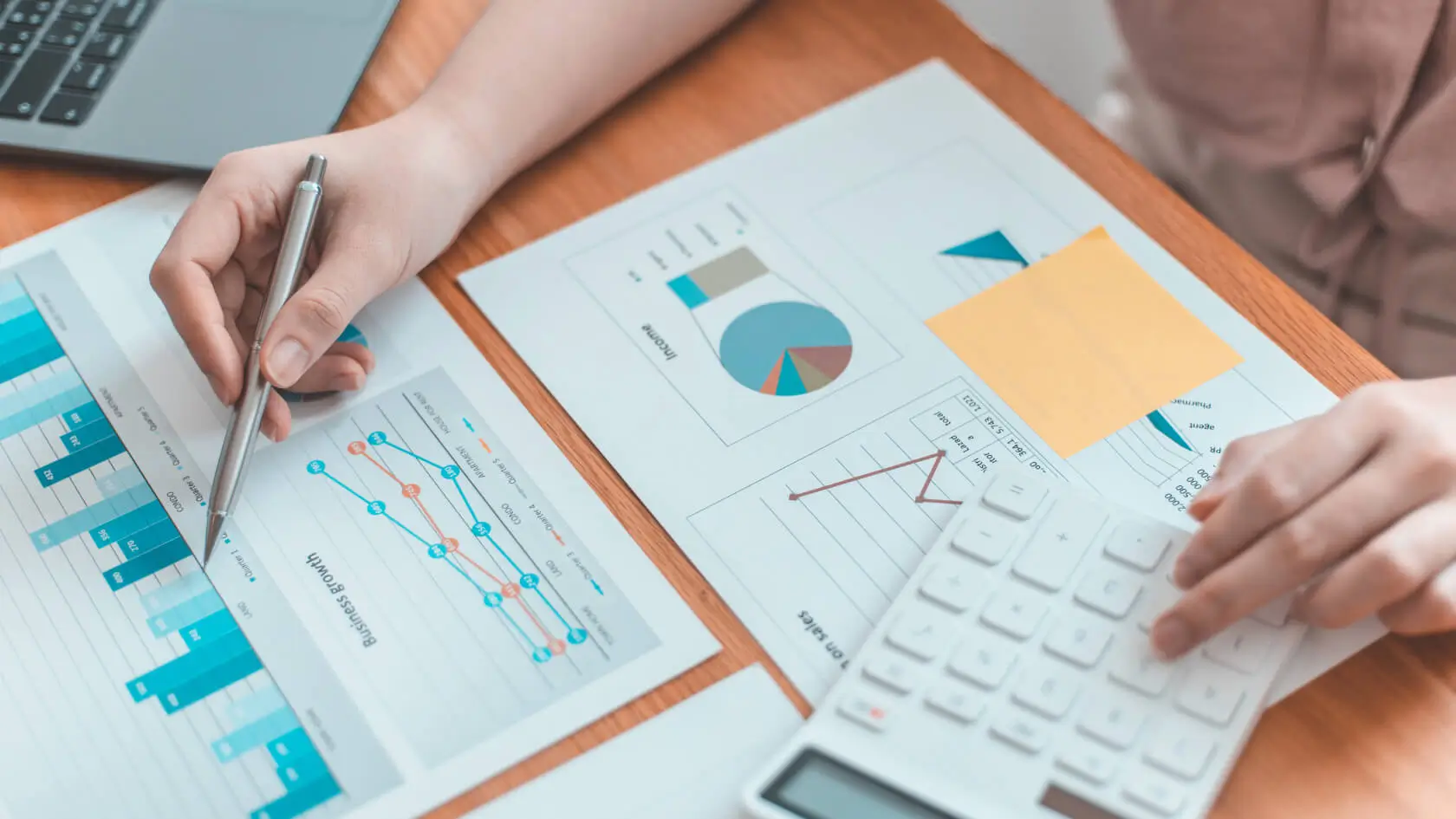 Business owner accessing cloud accounting dashboard on laptop