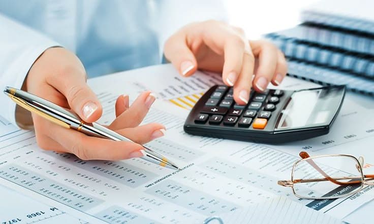 Accountant preparing corporate tax documents